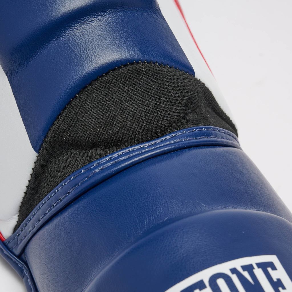 Espinilleras Leone 1947 Color Block Azul y Rojo para Muay Thai y MMA